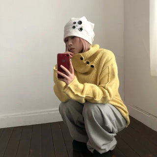 yellow button knit