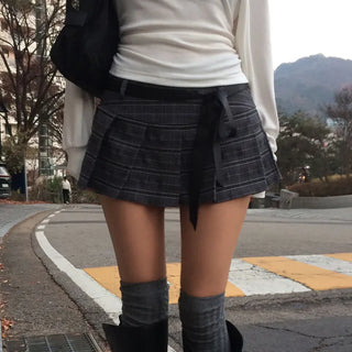 Teloy ribbon check pleated skirt