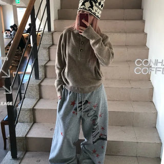 red star lettering pants