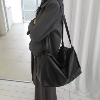 Black boxy shoulder bag