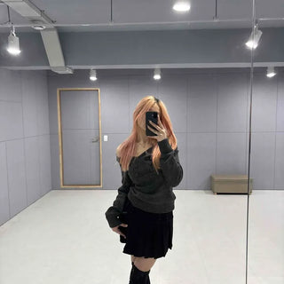 Black pleated mini skirt