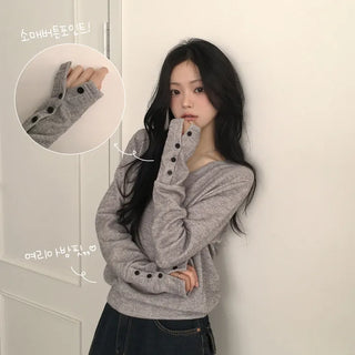 Effortlessly chic, Ribbed V-neck Delicate Avant-garde Loose Fit Sleeve Button Slit Knit Sweatshirt Long Sleeve T-shirt