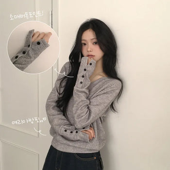 Effortlessly chic, Ribbed V-neck Delicate Avant-garde Loose Fit Sleeve Button Slit Knit Sweatshirt Long Sleeve T-shirt