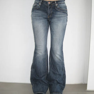 Low bootcut denim pants with brush pocket details