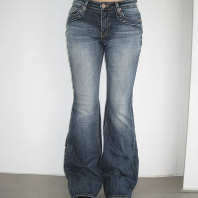 Low bootcut denim pants with brush pocket details