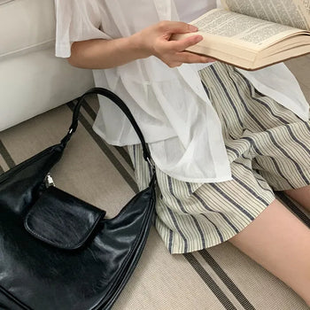 Satiq Rounded Leather Shoulder Bag