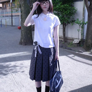Belted polka dot pleated midi skirt