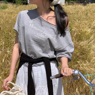 Renko Lettering Print Asymmetrical Off-Shoulder Loose Fit Short Sleeve T-Shirt