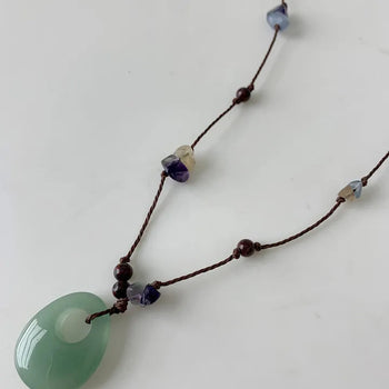 Green stone cord necklace