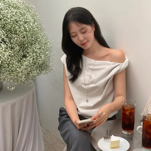 Vapor Asymmetrical Twist Off-Shoulder Sleeveless Blouse