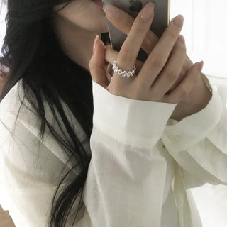 Three-strand silver ball ring