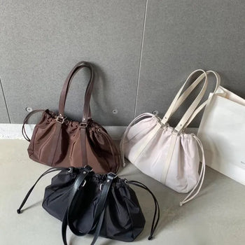 Nipoly nylon aperture shoulder bag