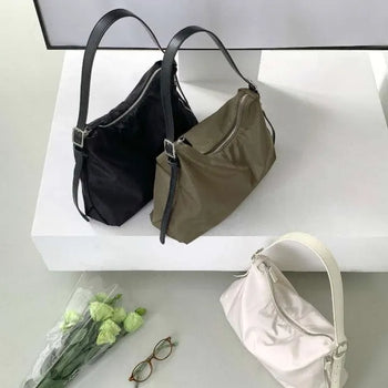 Mute side zipper shoulder crossbody bag