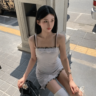 Lace diagonal sleeveless top