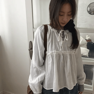 Gizeh frill ribbon blouse