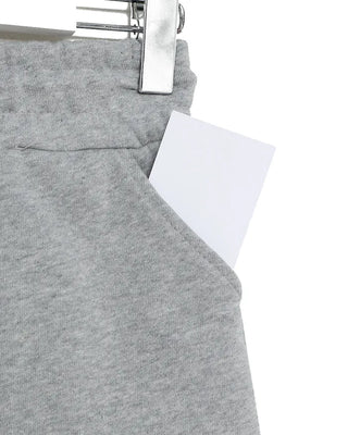 Shoulder-cut top & skort sweatpants