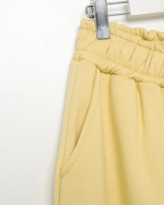 Fleece-lined one-pleat sweatpants
