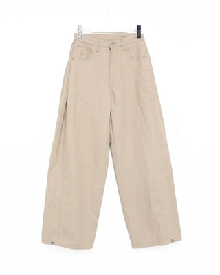 Side-tucked white cotton pants