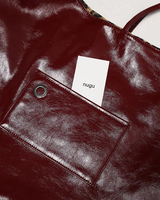Leather leopard reversible eyelet one-shoulder bag