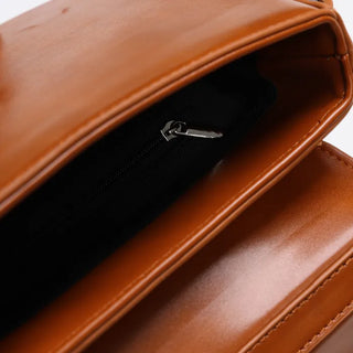 Round flap shoulder bag