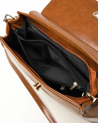 Gold button shoulder bag