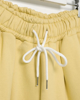 Fleece-lined one-pleat sweatpants