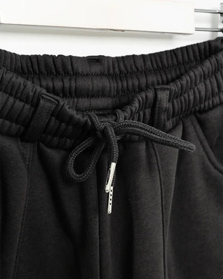 Wide sweatpants with side pockets