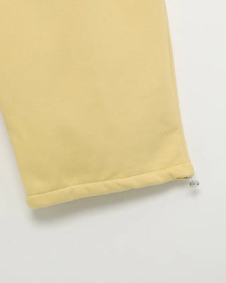 Fleece-lined one-pleat sweatpants