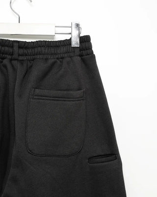 Wide sweatpants with side pockets