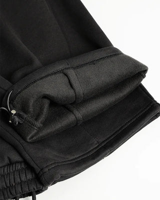 Wide sweatpants with side pockets