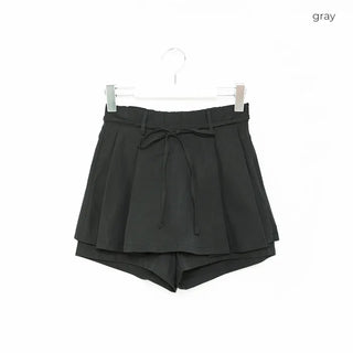 Waist ribbon pleated mini skirt