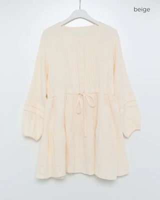 Shirred dress with strings