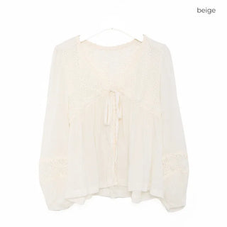 Punched open ribbon blouse