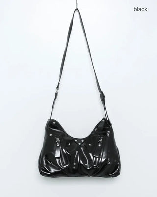 Multi-zip studded shoulder bag