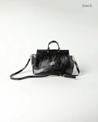 Gold button shoulder bag