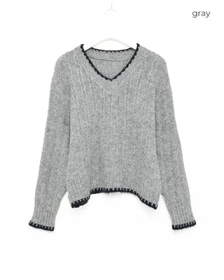 V-neck two-tone cable knit sweater