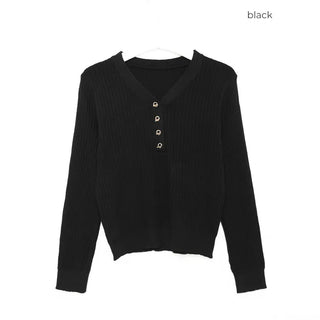 V-neck ribbed knit with gold buttons.