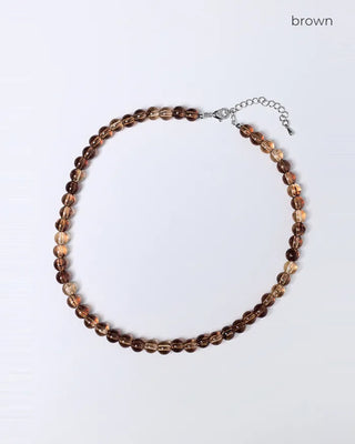 Clear brown ball necklace