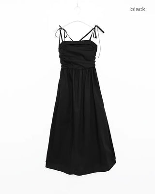 Side-tucked flared long dress