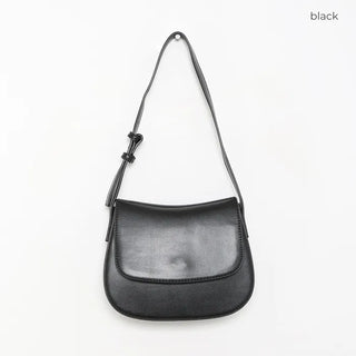 Round flap shoulder bag