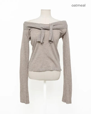 Tie-off shoulder knit