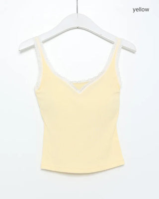 Sleeveless top with lace cap