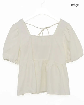 Voluminous peplum blouse