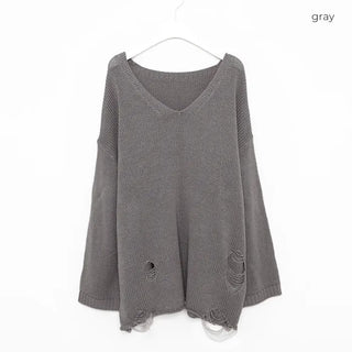 Distressed long knit sweater