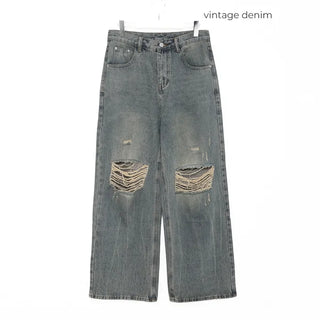 Distressed denim pants