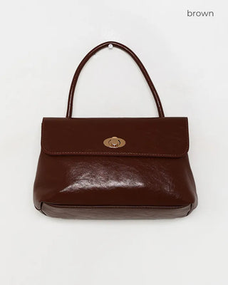 One-button leather handbag