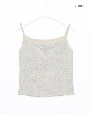 Sleeveless dress with ruffled hem and buttons