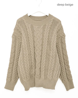 Loose-fitting cable knit round neck sweater