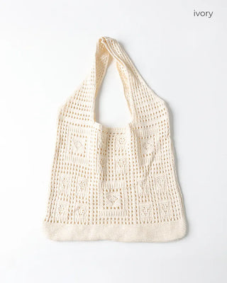 Perforated knit shoulder bag