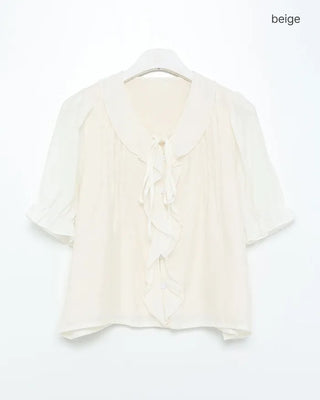 Pintuck ruffle bow tie blouse